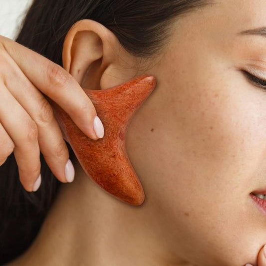 gua sha en bois massage visage